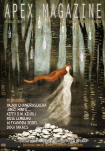 a magazine cover with a woman in a white dress.
