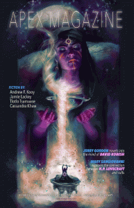 a magazine cover with a woman holding a candle.