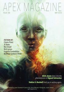 a magazine cover with an image of a woman's face.