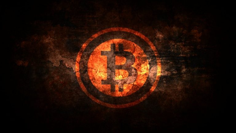 a bitcoin logo on a dark background.