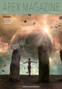 The cover of Apex Magazine Issue 6 with a woman standing between two large rocks.