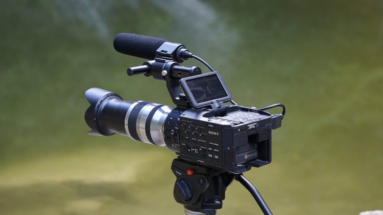 a video camera attached to a tripod.