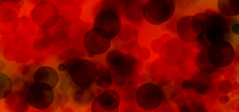 a red and yellow background with circles.