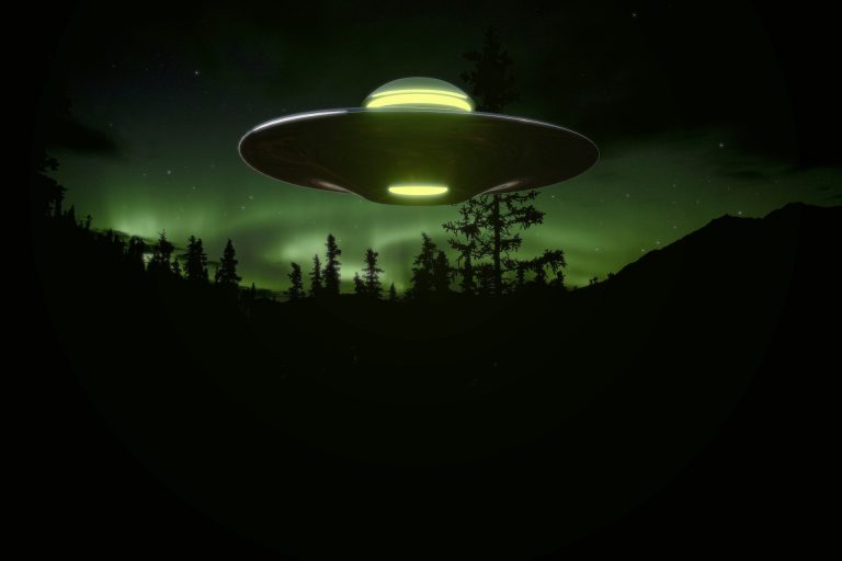 an alien flying over a forest under a green sky.