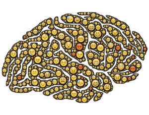 a drawing of a brain made up of smiley faces.