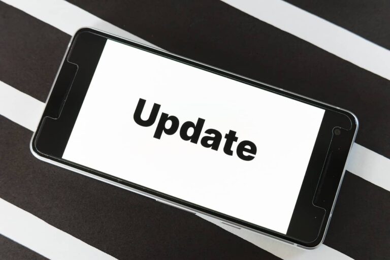 a cell phone with the word update on the screen.